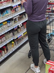 Milf with slight wedgie showing