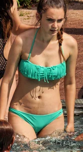 Hot big boobed girl in bikini at the pool