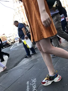Cute Teen Girl in a Dress With Slim Legs Standing in the Subway Train, Then Crossing the Street Photo Gallery