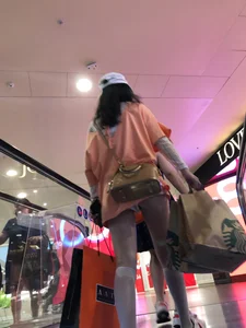 Girl in Knee Socks and Mini Shorts on the Mall Escalator Creepshot