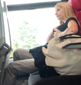 Hot busty blonde on train