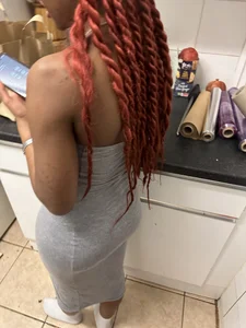 Very cute girl wearing a long tight grey dress kitchen creepshots
