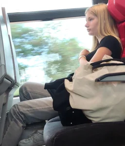 Hot busty blonde on train