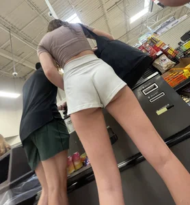 Tall blonde booty peeking out of shorts😼(OC)