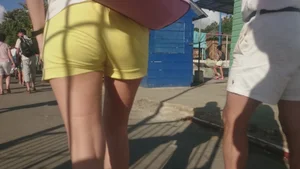 Milf in yellow shorts with vpl and a wedgie