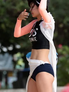 Skinny Asian milf on the beach with sexy body
