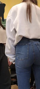 Girl is showing her blue jeans