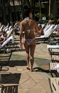 Sexy Skinny Girl in Swimsuit Walking at a Poolside Creepshot