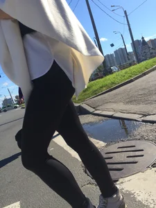 Blonde Girl With Fit Muscular Legs in Tight Black Jeans and Sneakers on a Crosswalk  - Street Creepshots Collection