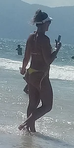 Big booty white chick in a yellow thong at the beach