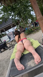 Bikini flower Bend over on the beach. OC