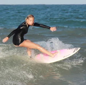 Hot surfer chicks out in the water