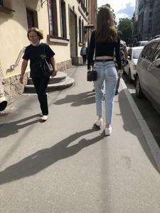 Awesome booty in ripped tight jeans street photos