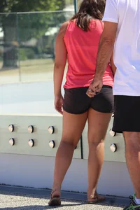 Thick girl in pink top and black shorts with vpl