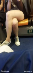 Hot candid girl's crossed legs in public transport creepshots