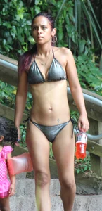 Sexy brunette milf in a bikini with a great body, nice ass and some camel toe