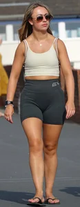 Blonde woman in lycra shorts - good front view, back view ruined by a bag
