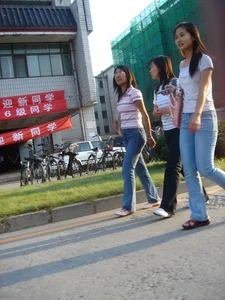 Cute Asian girl with a nice booty in tight jeans