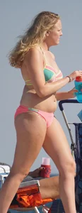 Thick blonde bikini babe on the beach