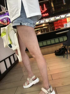 Candid blonde with hot legs at the foodcourt creepshots