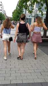 Group of hot chicks in shorts and skirts on the street creepshot