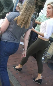 Sexy blonde out walking in green leggings with vpl