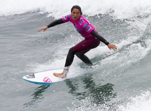 Candid surfer babes on the beach and in bikinis