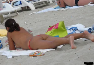 Beach voyeur babes in bikinis, thongs and topless