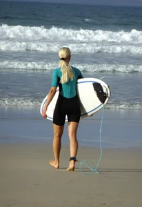 Candid surfer babes on the beach and in bikinis