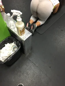 Sweaty Girl in Yoga Pants Working Out on a Mat