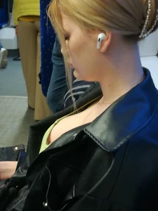 Candid in a leather jacket, closeup of her boobs