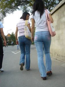 Cute Asian girl with a nice booty in tight jeans
