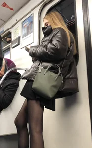 Sexy candid legs in black pantyhose subway train creepshot