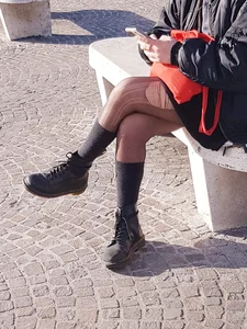 Candid Girl in Torn Black Pantyhose Sitting on the Bench With Crossed Legs Street Creepshort