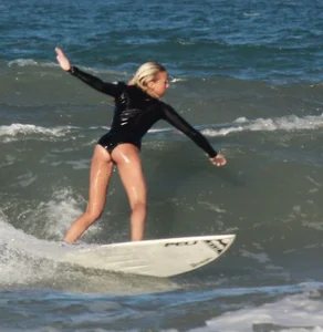 Hot surfer chicks out in the water