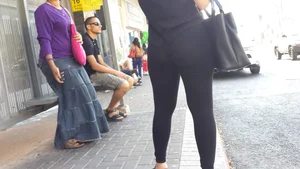 Sexy ass in leggings waiting for the bus