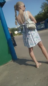 Skinny Blonde in Sandals, Dress and Sunglasses Standing on the Bus Stop Creepshot