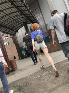 A Gorgeous Tall Ginger Girl in Shorts And Sandals With Tattooed Legs Street Creepshots