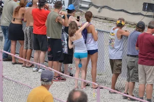Skinny babe with a cute little ass in tiny blue shorts