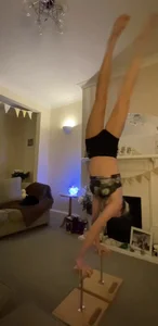 Skinny gymnast girl training at home