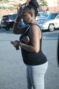 Ebony milf out shopping in grey leggings