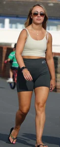 Blonde woman in lycra shorts - good front view, back view ruined by a bag