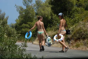 Nude girls on a beach in Hvar, Croatia