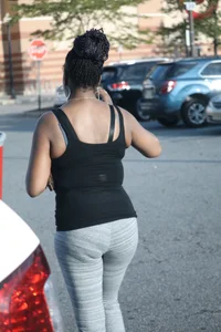 Ebony milf out shopping in grey leggings