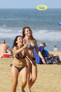 Sexy mix of girls in bikinis at the beach