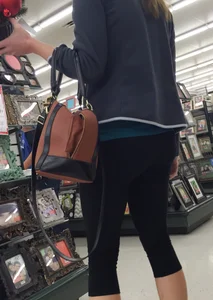 Sexy lady shopping at Walmart in leggings