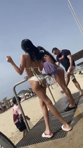 Skinny girl in a swimsuit at the beach