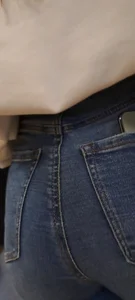 Girl is showing her blue jeans