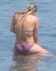 Hilary Duff in purple bikini in Malibu with a great ass and hard nipples