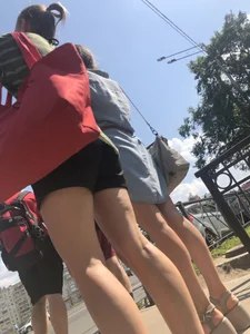 Hot girl in short dresses and skirts on the crosswalk street creepshots